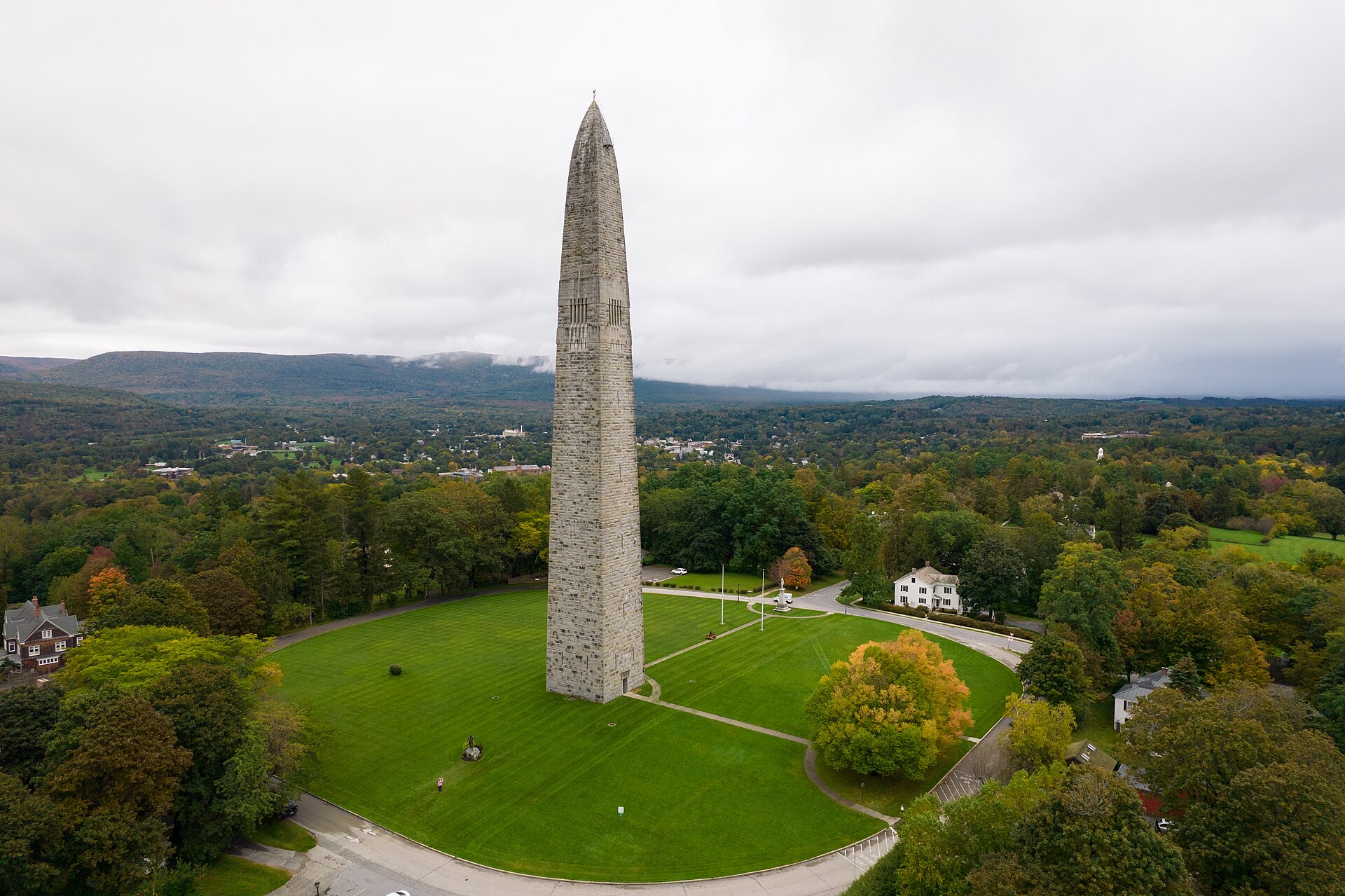 The Bennington Battle Monument rising above autumn trees