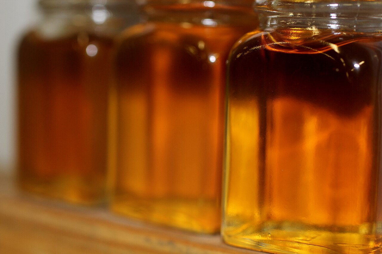 Graded bottles of Vermont maple syrup