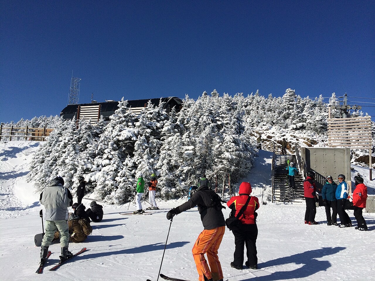 A skier on a snowy trail at a Vermont resort