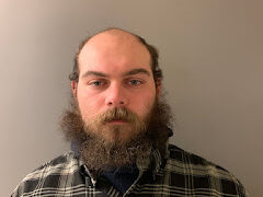 Waterville man arrested on warrant for driving with suspended license, police say