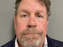 Pickup truck against a guardrail after a Rochester DUI crash on Route 73