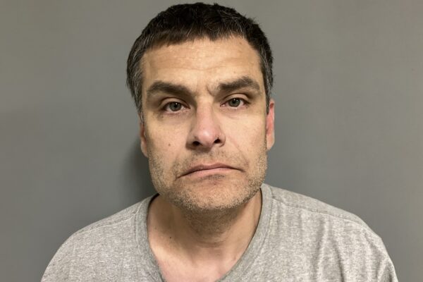 Hartland man arrested on warrant after disabled vehicle incident, police say