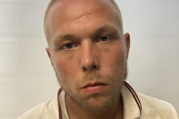 Arlington man arrested on warrant for unlawful trespass, police say